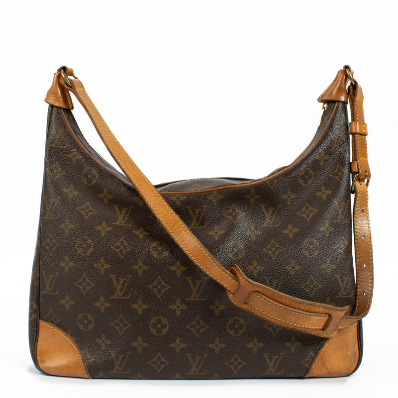 Louis Vuitton Monogram Vintage Boulogne Bag with iconic Monogram canvas, adjustable strap, and natural leather accents, showing minor signs of use for a classic vintage look. Shop now on Labellov.com.