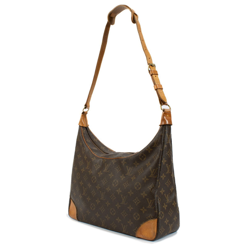Louis Vuitton Monogram Vintage Boulogne Bag with iconic Monogram canvas, adjustable strap, and natural leather accents, showing minor signs of use for a classic vintage look. Shop now on Labellov.com.