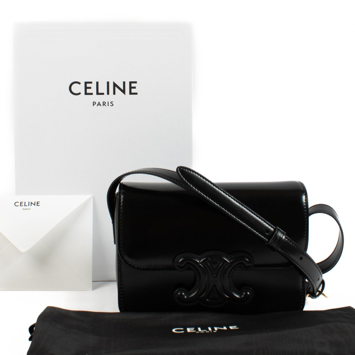 Celine All Black Teen Triomphe Bag in smooth black leather with a matching Triomphe clasp and adjustable strap for a sleek, timeless look. Shop now on Labellov.com.