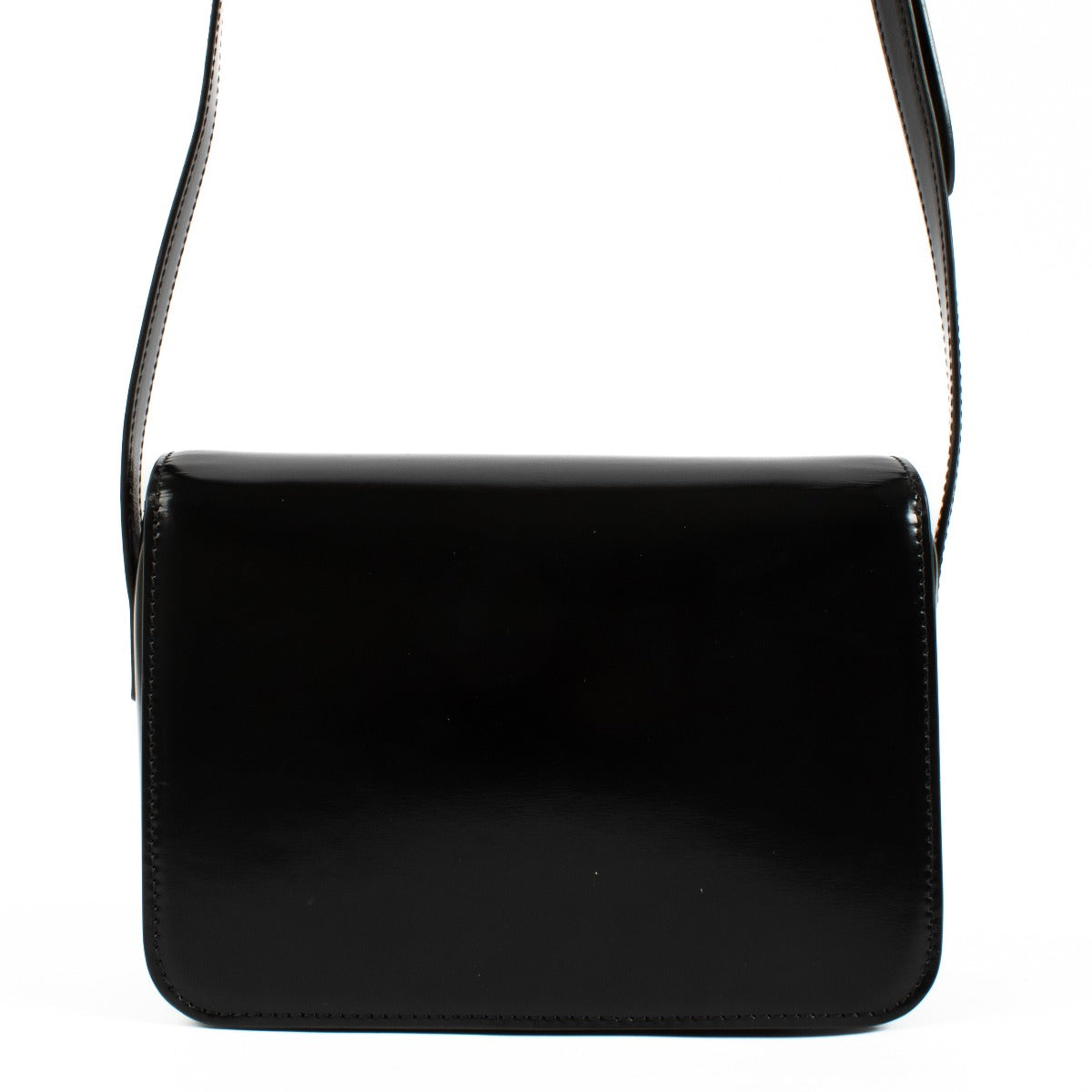 Celine All Black Teen Triomphe Bag in smooth black leather with a matching Triomphe clasp and adjustable strap for a sleek, timeless look. Shop now on Labellov.com.