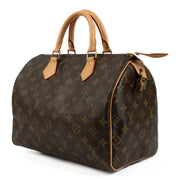 The Louis Vuitton Monogram Speedy 30 is an iconic and stylish handbag, crafted from signature Monogram canvas with natural leather handles. Lightweight, spacious, and perfect for everyday use. Shop now on Labellov.com.