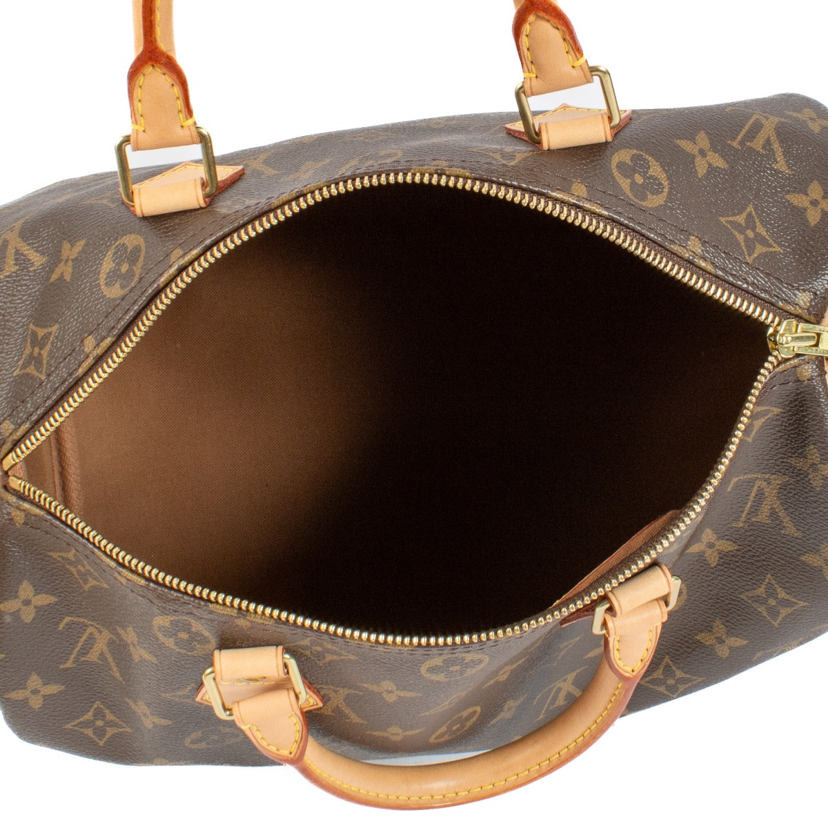 The Louis Vuitton Monogram Speedy 30 is an iconic and stylish handbag, crafted from signature Monogram canvas with natural leather handles. Lightweight, spacious, and perfect for everyday use. Shop now on Labellov.com.
