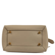 The Celine Beige Mini Belt Bag is a chic and compact leather accessory featuring a structured design, belt buckle closure, and detachable shoulder strap, perfect for day-to-night wear. Shop now on Labellov.com.