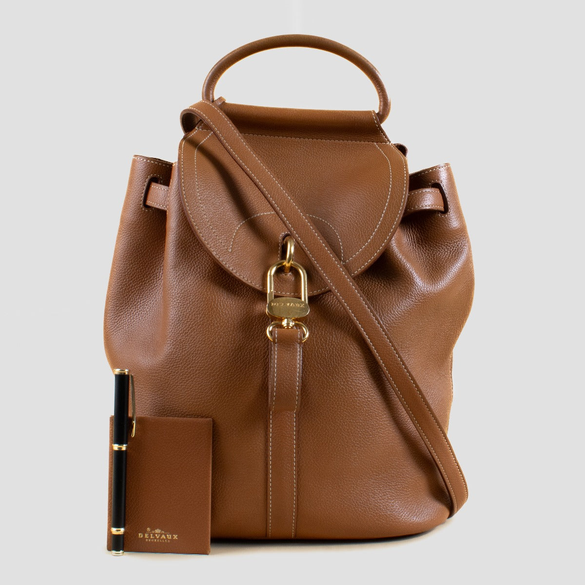 Shop 100% authentic second hand Delvaux Camel Lucifer PM Backpack on Labellov.com