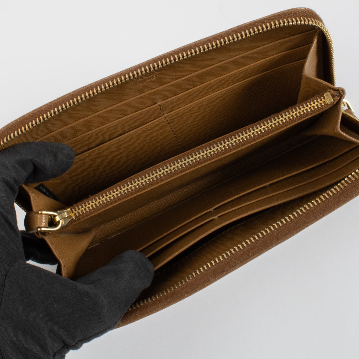 Shop 100% authentic second hand Prada Camel Zip Wallet on Labellov.com