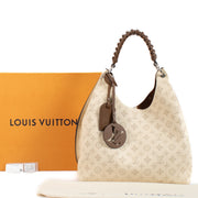 shop 100% authentic second hand Louis Vuitton Creme Mahina Carmel Hobo Bag on Labellov.com