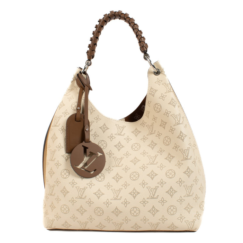 shop 100% authentic second hand Louis Vuitton Creme Mahina Carmel Hobo Bag on Labellov.com