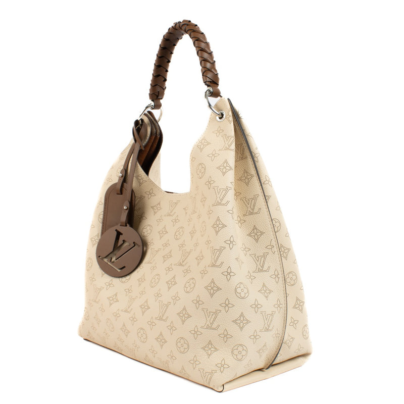shop 100% authentic second hand Louis Vuitton Creme Mahina Carmel Hobo Bag on Labellov.com