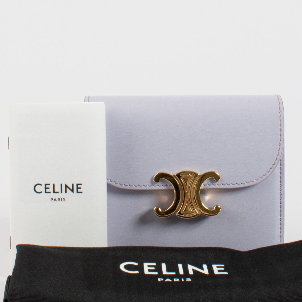 Shop safe online at Labellov in Antwerp, Brussels and Knokke this 100% authentic second hand Celine Pastel Mauve Small Flap Triomphe Wallet.