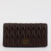 Shop safe online at Labellov in Antwerp, Brussels and Knokke this 100% authentic second hand Miu Miu Bruyère Matelasse Flap Wallet