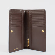 Shop safe online at Labellov in Antwerp, Brussels and Knokke this 100% authentic second hand Miu Miu Bruyère Matelasse Flap Wallet