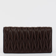 Shop safe online at Labellov in Antwerp, Brussels and Knokke this 100% authentic second hand Miu Miu Bruyère Matelasse Flap Wallet