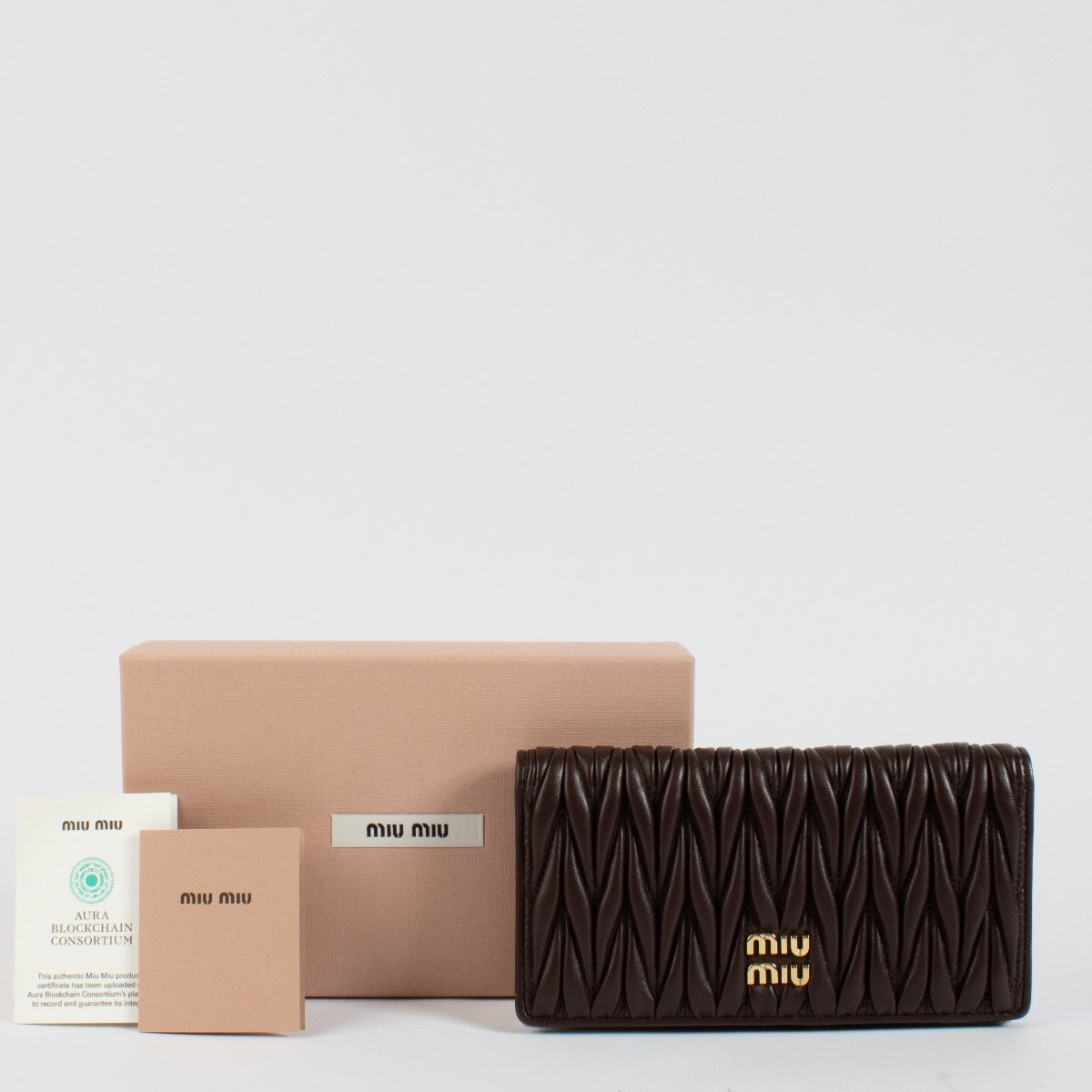 Shop safe online at Labellov in Antwerp, Brussels and Knokke this 100% authentic second hand Miu Miu Bruyère Matelasse Flap Wallet