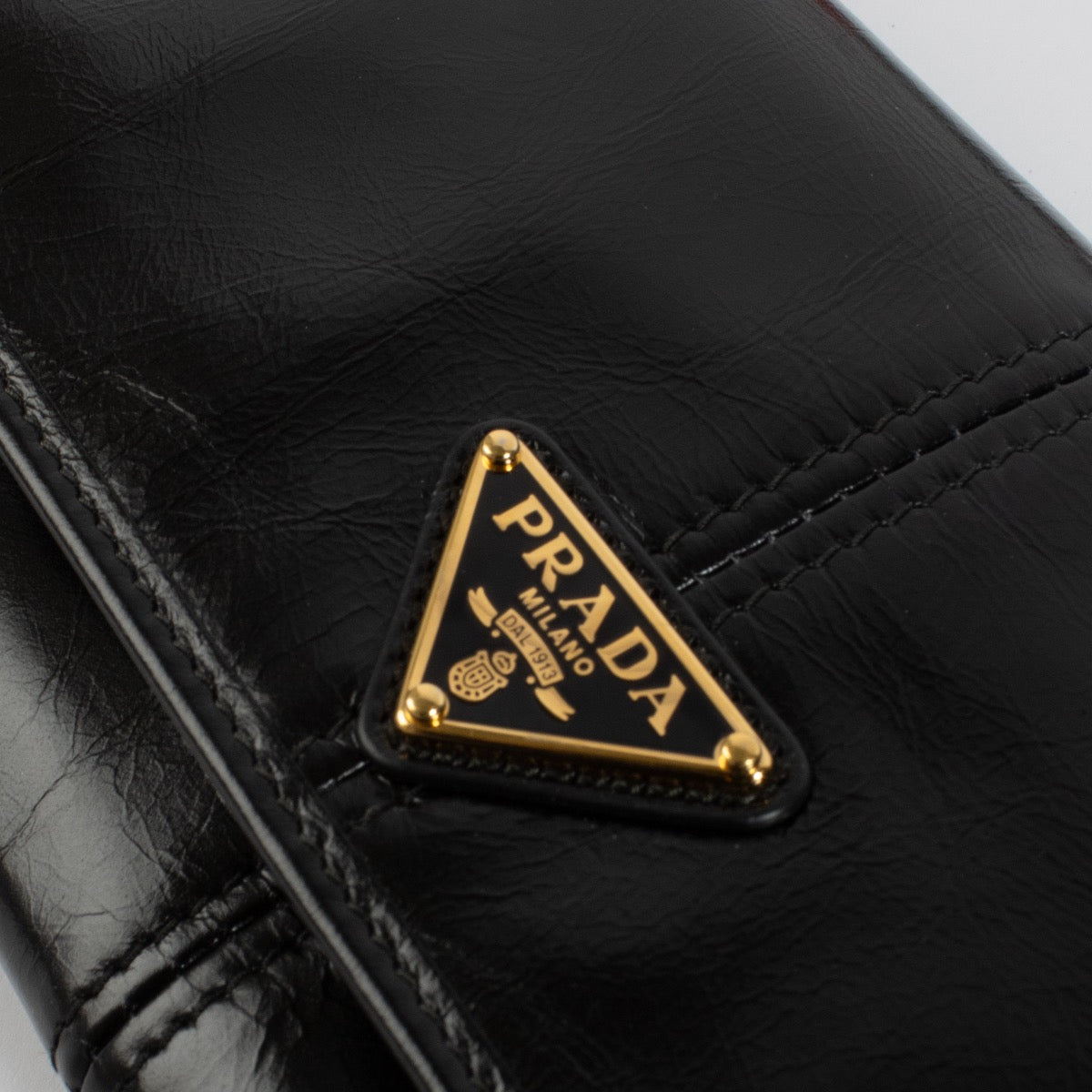 Shop safe online at Labellov in Antwerp, Brussels and Knokke this 100% authentic Prada Black Long Wallet