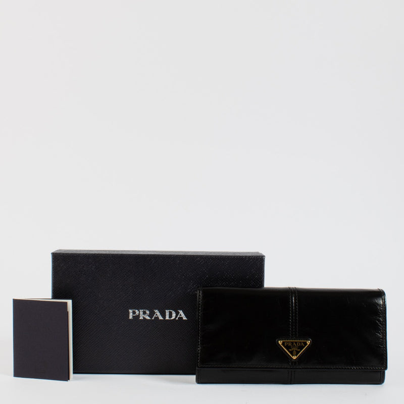 Shop safe online at Labellov in Antwerp, Brussels and Knokke this 100% authentic Prada Black Long Wallet