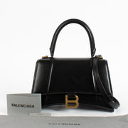 Shop the authentic Balenciaga Black Hourglass Small Bag second hand on Labellov.com.
