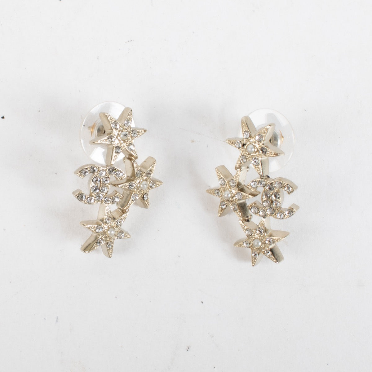 Authentic Second Hand Chanel 17V Star Crystal Earrings on Labellov.com