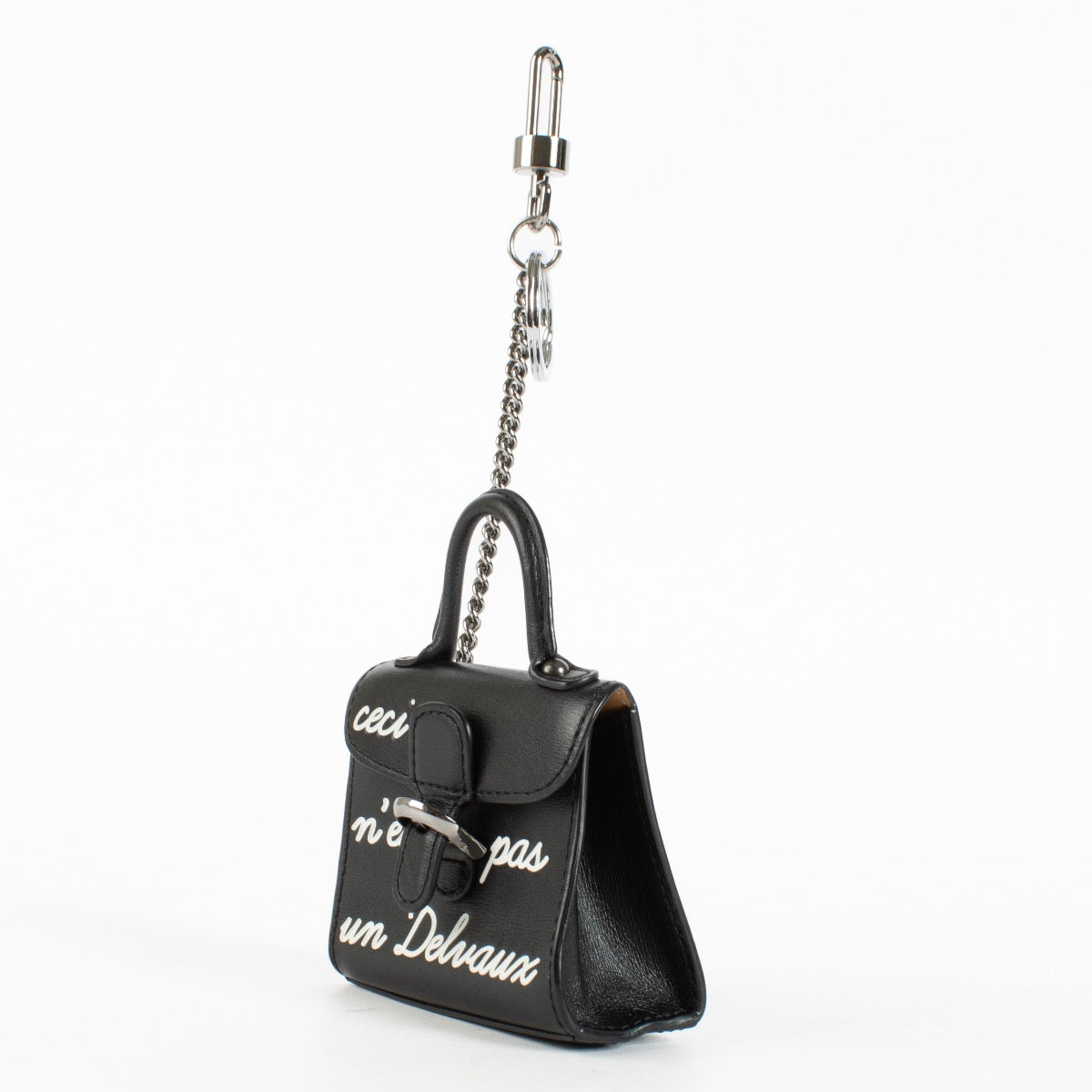 Discover the Delvaux Black Brillant L’Humour Charm in as new condition, complete with box and dust bag. Shop authentic luxury accessories at Labellov.com.
