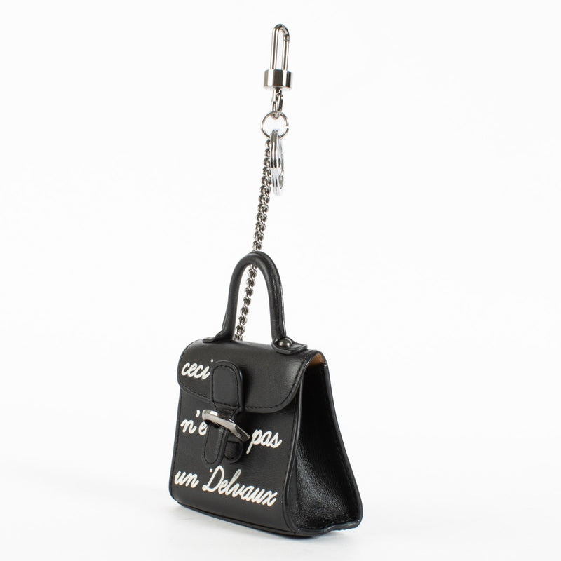 Discover the Delvaux Black Brillant L’Humour Charm in as new condition, complete with box and dust bag. Shop authentic luxury accessories at Labellov.com.