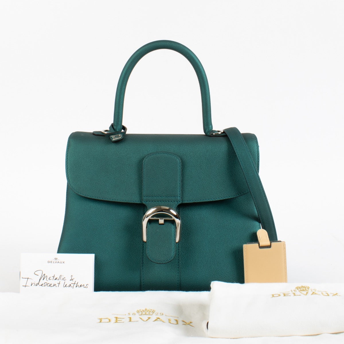 Authentic pre-loved Delvaux Metallic Peacock Rodeo Calf Brillant MM Bag on Labellov.com