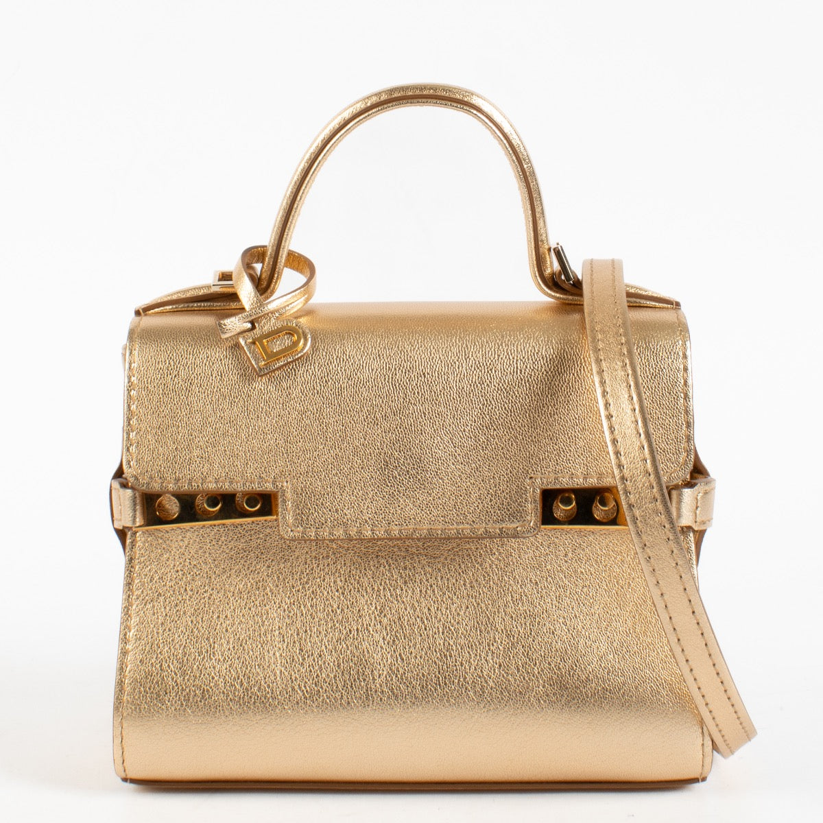Shop this Delvaux Gold Metallic Mini Brillant Bag in very good condition. Includes dust bag and strap. Discover this iconic piece at Labellov.com