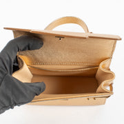Shop this Delvaux Gold Metallic Mini Brillant Bag in very good condition. Includes dust bag and strap. Discover this iconic piece at Labellov.com
