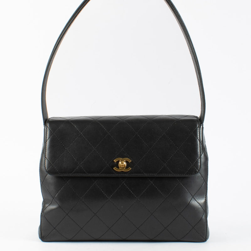 A sophisticated Chanel Black Leather Shoulder Bag featuring classic diamond quilting, gold-tone CC hardware, and a timeless silhouette—an iconic addition to any luxury wardrobe.