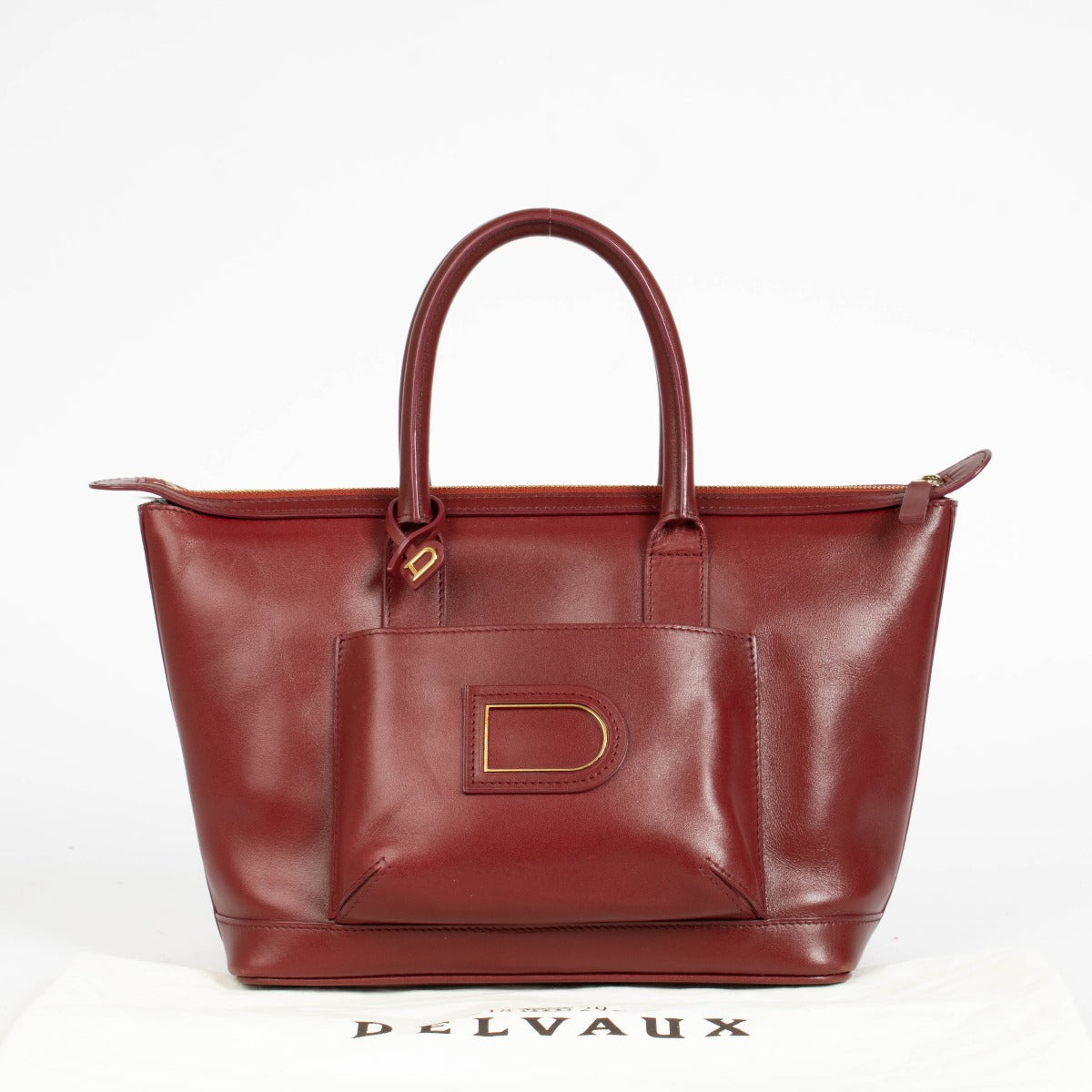 Authentic pre-loved Delvaux Burgundy Clandestin Trotteur Top Handle Bag on Labellov.com