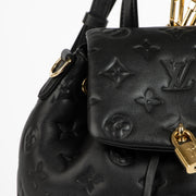 Shop this 100% authentic Louis Vuitton Black Coussin Backpack at Labellov.com