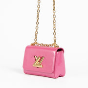 Shop this 100% authentic Louis Vuitton Pink Vernis Twist Little Bag at Labellov.com
