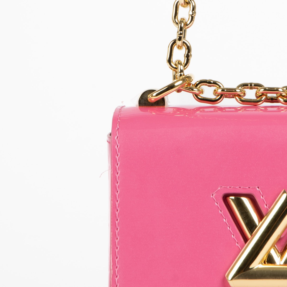 Shop this 100% authentic Louis Vuitton Pink Vernis Twist Little Bag at Labellov.com
