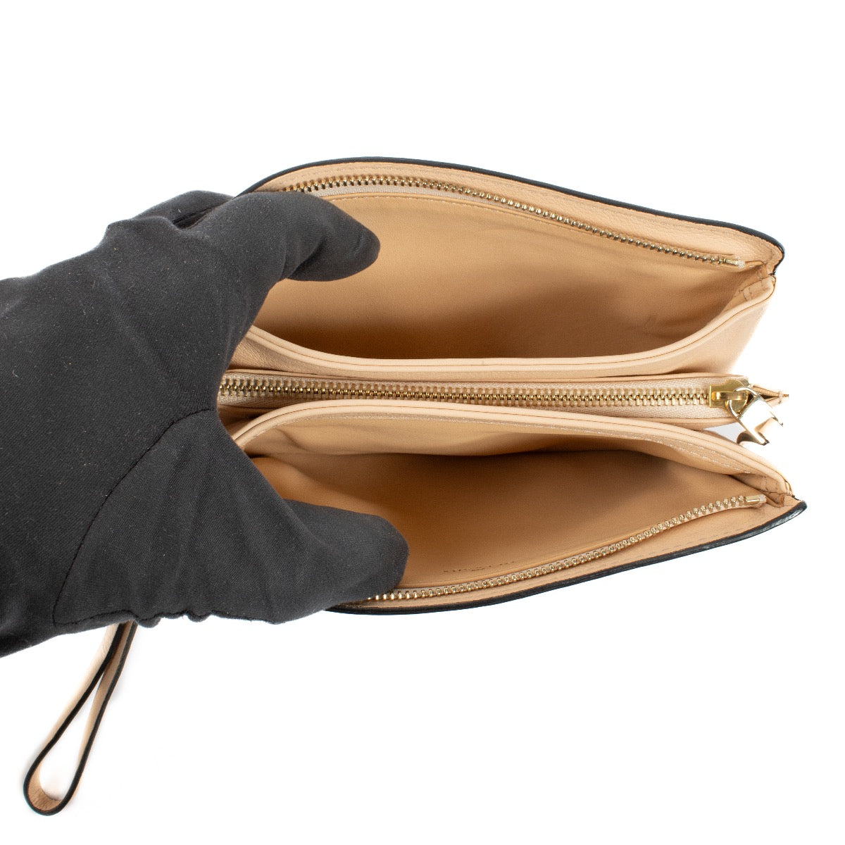Buy authentic second hand Delvaux Nude Leather Pouch Wallet at Labellov.com