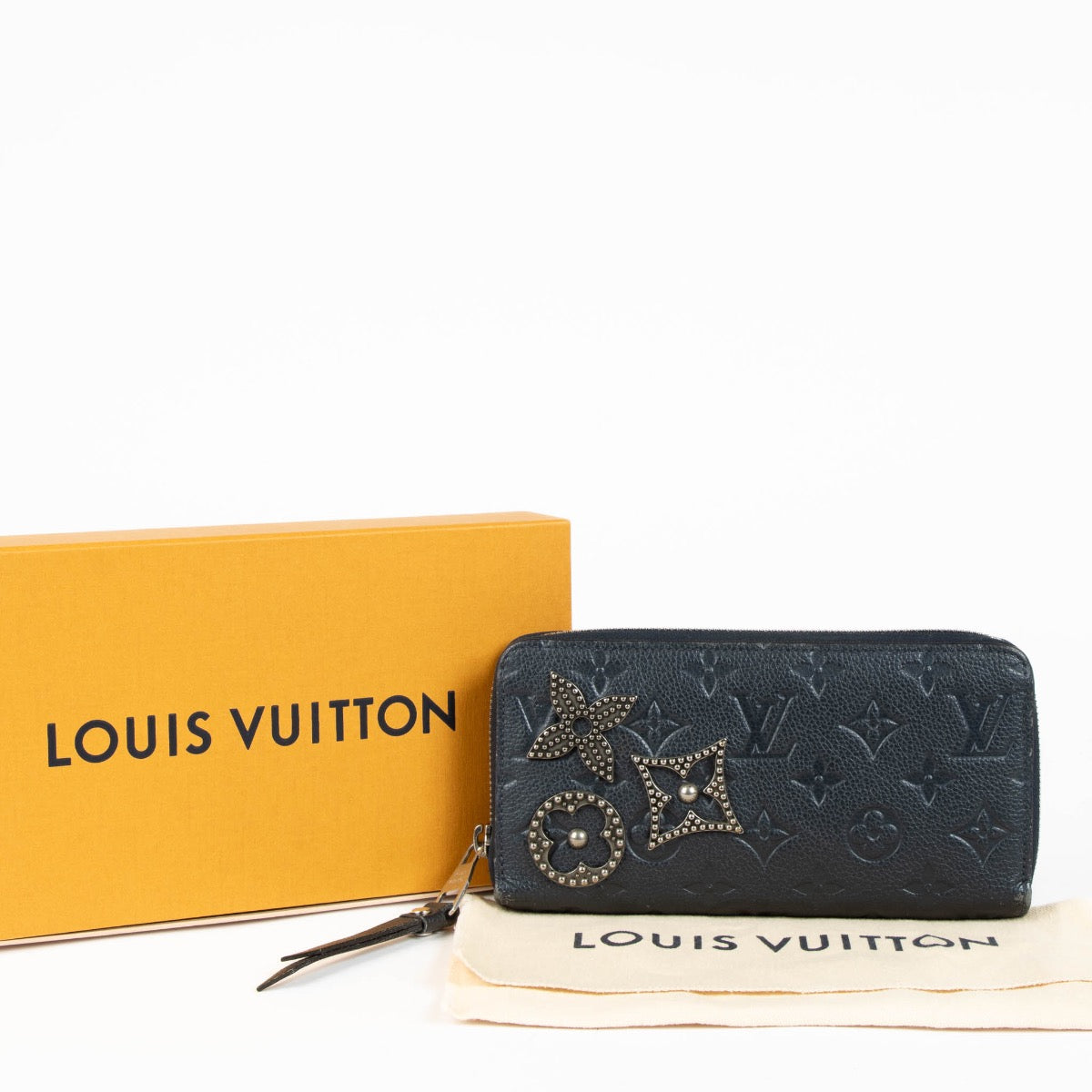 Authentic pre-loved Louis Vuitton Blue Monogram Empreinte With Pins Zippy Wallet on Labellov.com