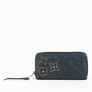 Authentic pre-loved Louis Vuitton Blue Monogram Empreinte With Pins Zippy Wallet on Labellov.com