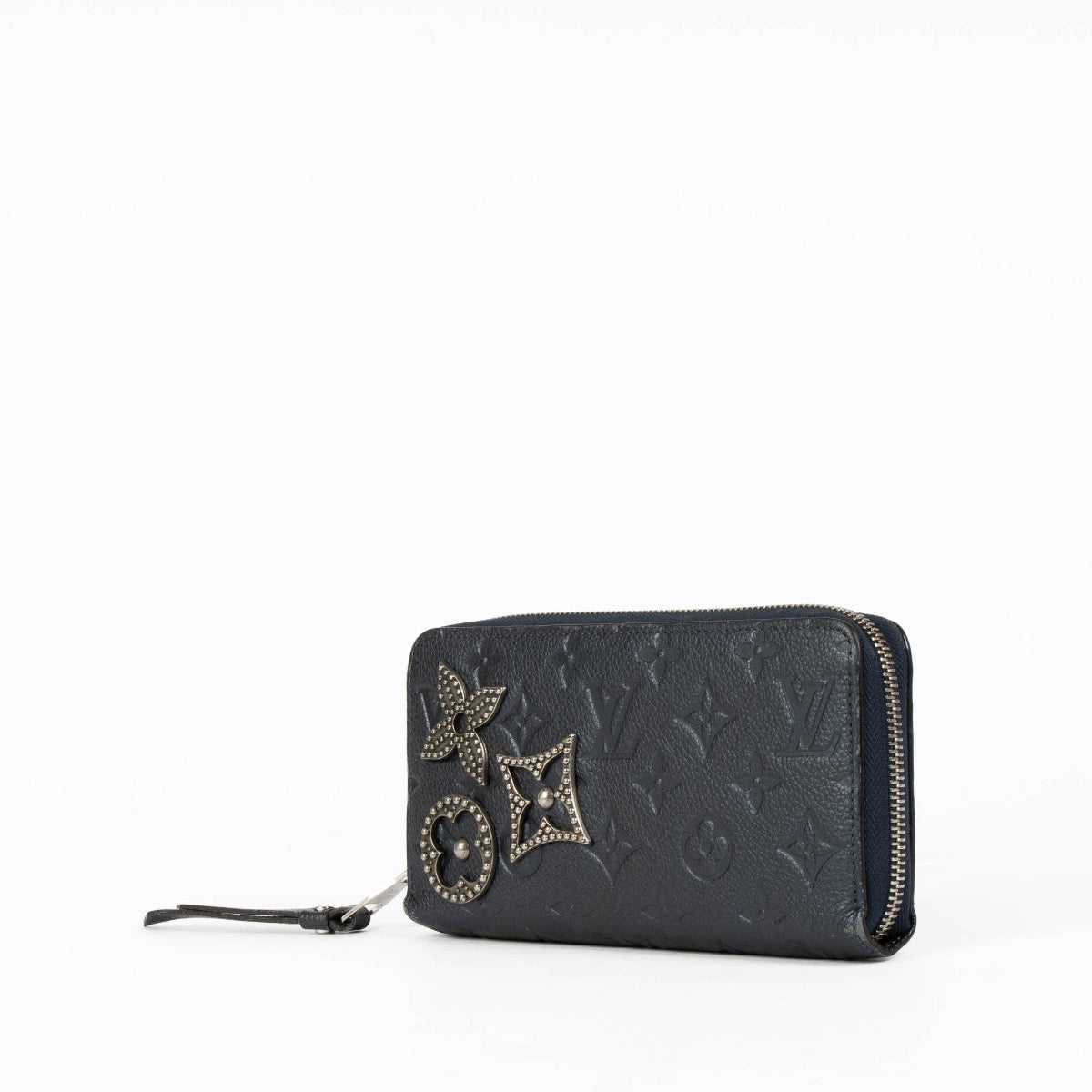 Authentic pre-loved Louis Vuitton Blue Monogram Empreinte With Pins Zippy Wallet on Labellov.com