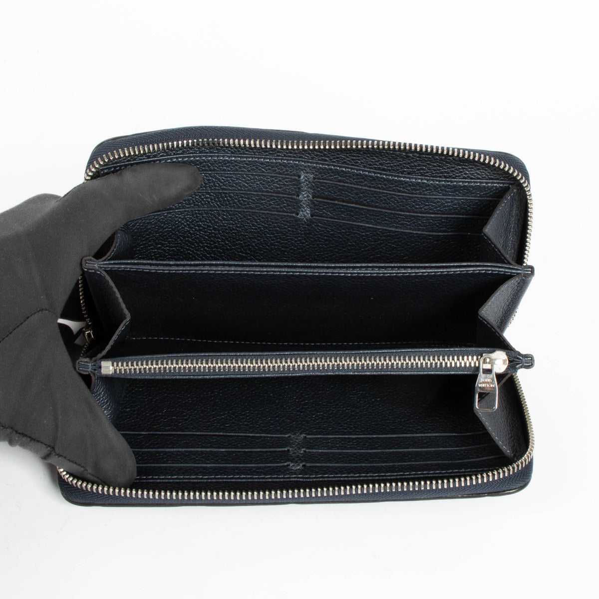 Authentic pre-loved Louis Vuitton Blue Monogram Empreinte With Pins Zippy Wallet on Labellov.com