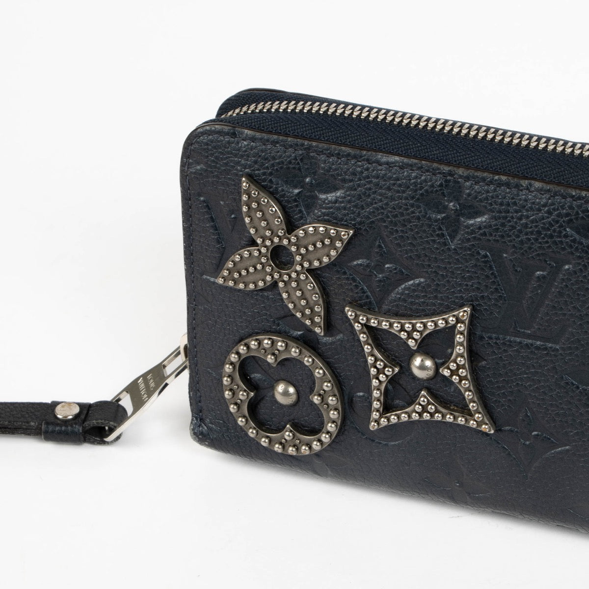 Authentic pre-loved Louis Vuitton Blue Monogram Empreinte With Pins Zippy Wallet on Labellov.com