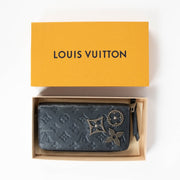 Authentic pre-loved Louis Vuitton Blue Monogram Empreinte With Pins Zippy Wallet on Labellov.com