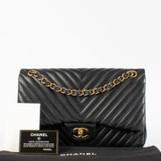 Shop 100% authentic second hand Chanel Black Chevron Classic Flap Bag on Labellov.com