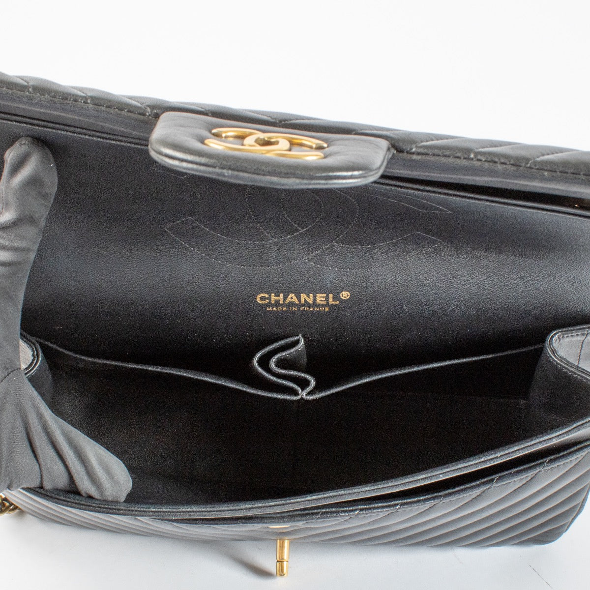 Shop 100% authentic second hand Chanel Black Chevron Classic Flap Bag on Labellov.com