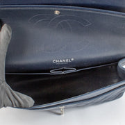 Shop safe online at Labellov in Antwerp, Brussels and Knokke this 100% authentic second hand Chanel Navy Blue Caviar Large Classic Flap Bag. Veilig online tweedehands authentieke Chanel Navy Blue Caviar Large Classic Flap Bag kopen bij Labellov