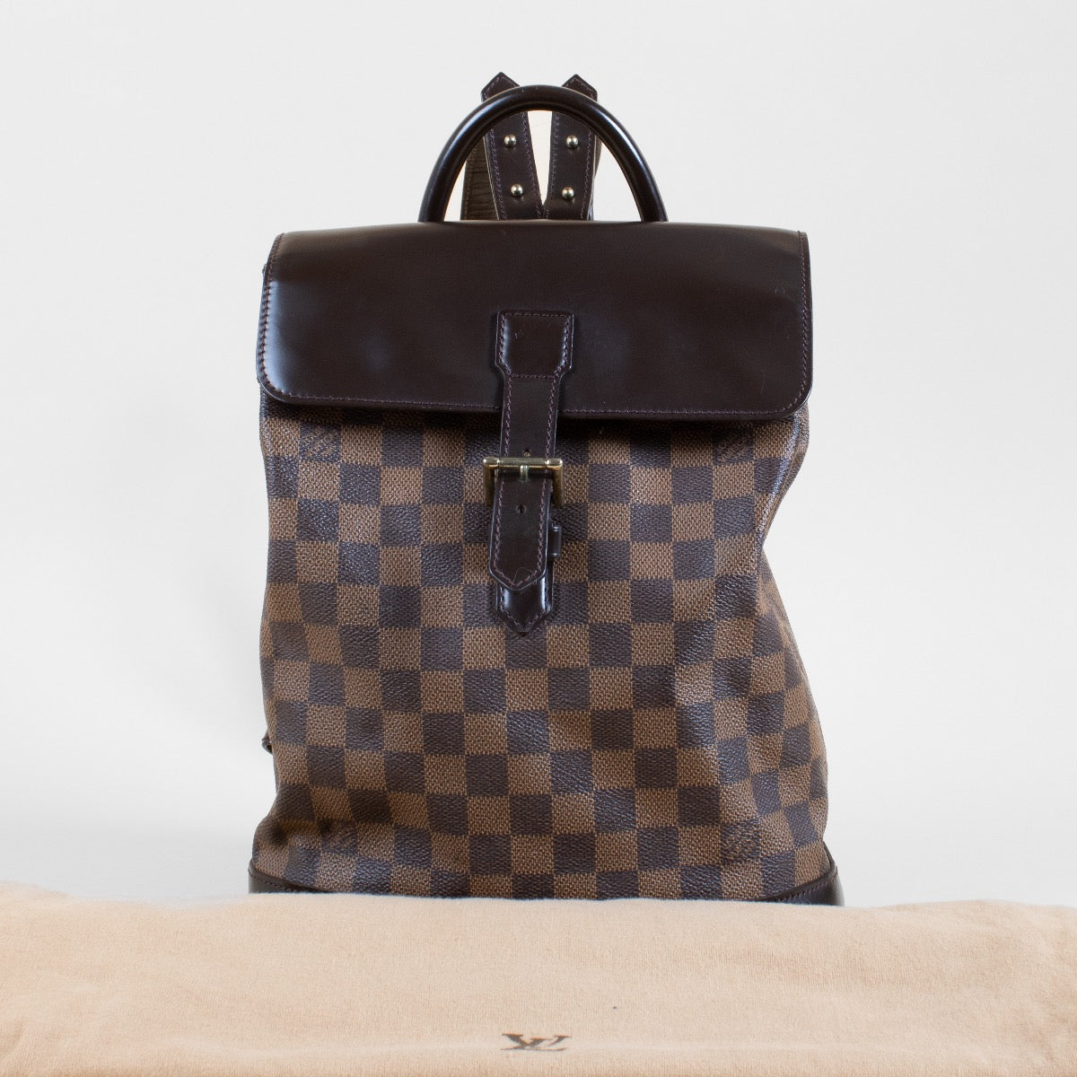 Authentic second hand Louis Vuitton Damier Ebene Soho Backpack on Labellov.com