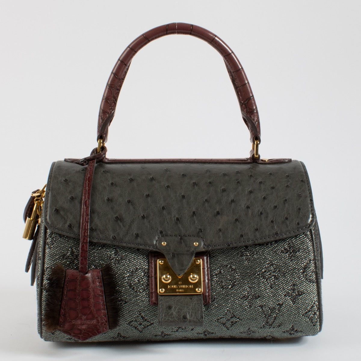 Shop 100% authentic second hand Louis Vuitton Alligator/Ostrich Comedie Carrousel Bag on Labellov.com
