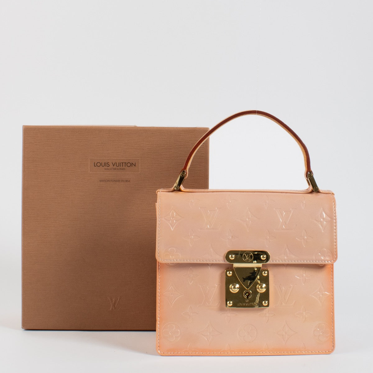 Shop 100% authentic second hand Louis Vuitton Pink Monogram Vernis Spring Street Bag on Labellov.com