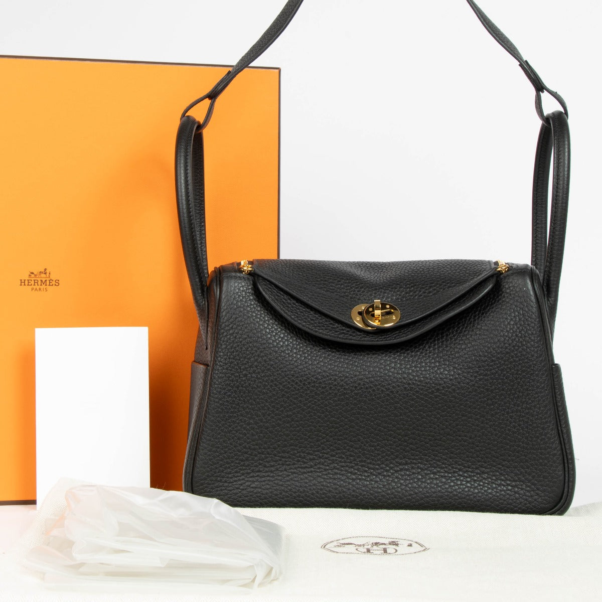 Shop this 100% authentic Hermès Lindy 26 Black Clemence GHW Top Handle Bag at Labellov.com