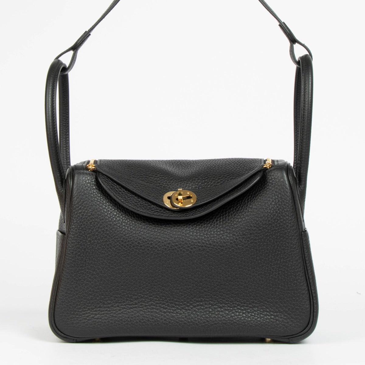 Shop this 100% authentic Hermès Lindy 26 Black Clemence GHW Top Handle Bag at Labellov.com