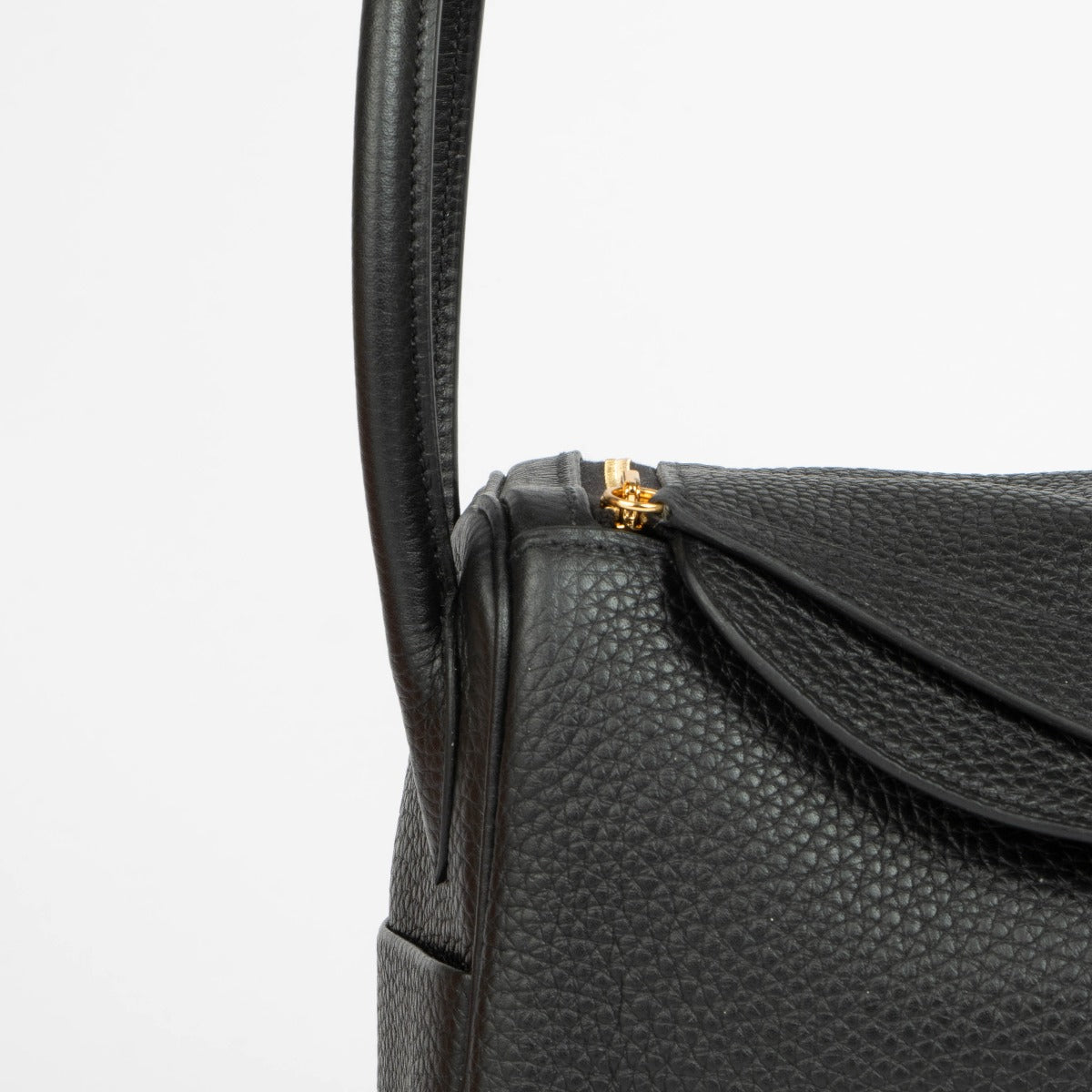 Shop this 100% authentic Hermès Lindy 26 Black Clemence GHW Top Handle Bag at Labellov.com