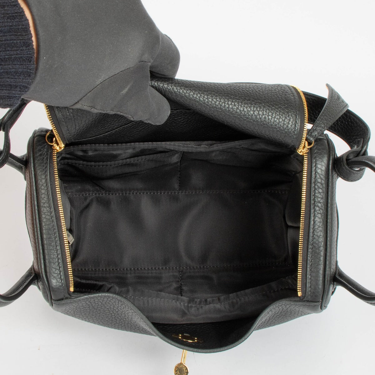 Shop this 100% authentic Hermès Lindy 26 Black Clemence GHW Top Handle Bag at Labellov.com