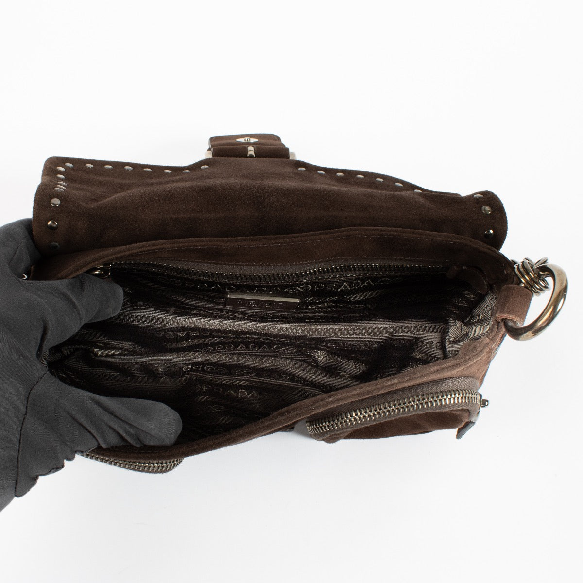 Shop safe online at Labellov in Antwerp and Knokke this 100% authentic second hand Prada Brown Suede Mini Studded Baguette Bag