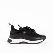 Shop this 100% authentic Chanel Black Leather/Velvet Sneakers at Labellov.com